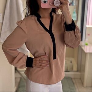 Elegant Tan Blouse with Black Trim